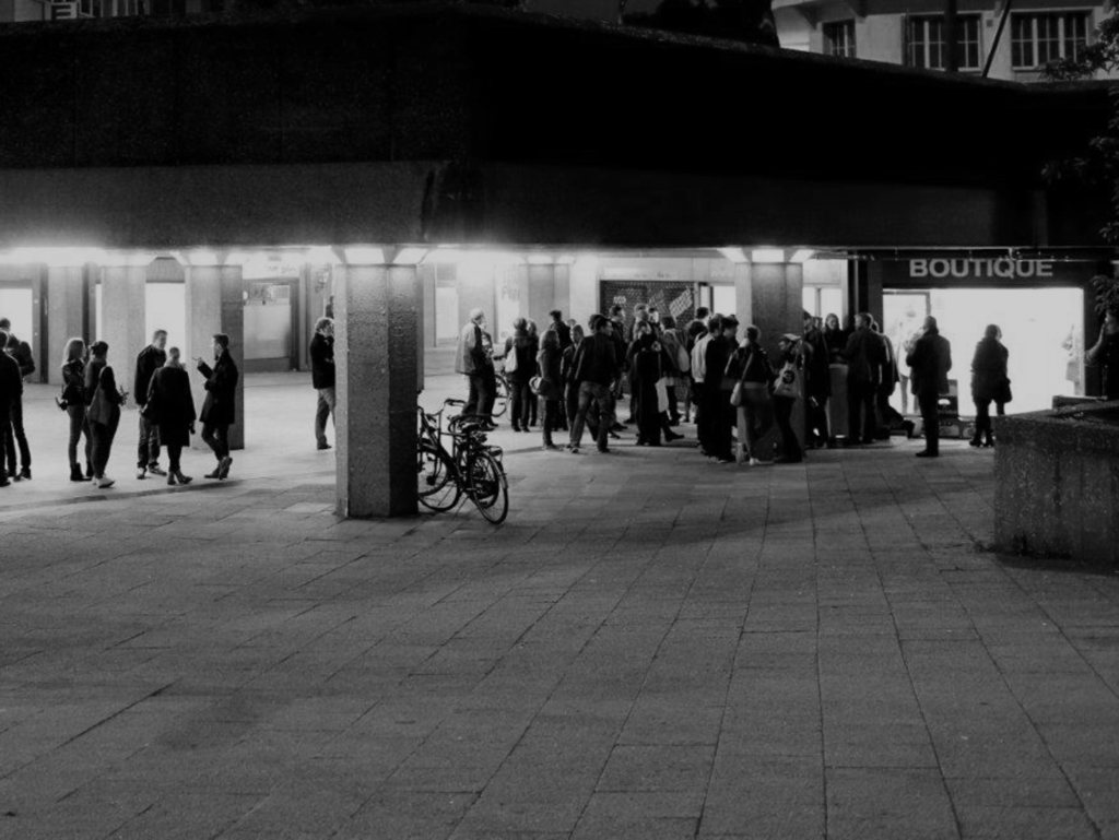 LocalNonOffline — the hanging banner '#LOCAL-NON-OFF-LINE' with the artist list at Ebertplatz
